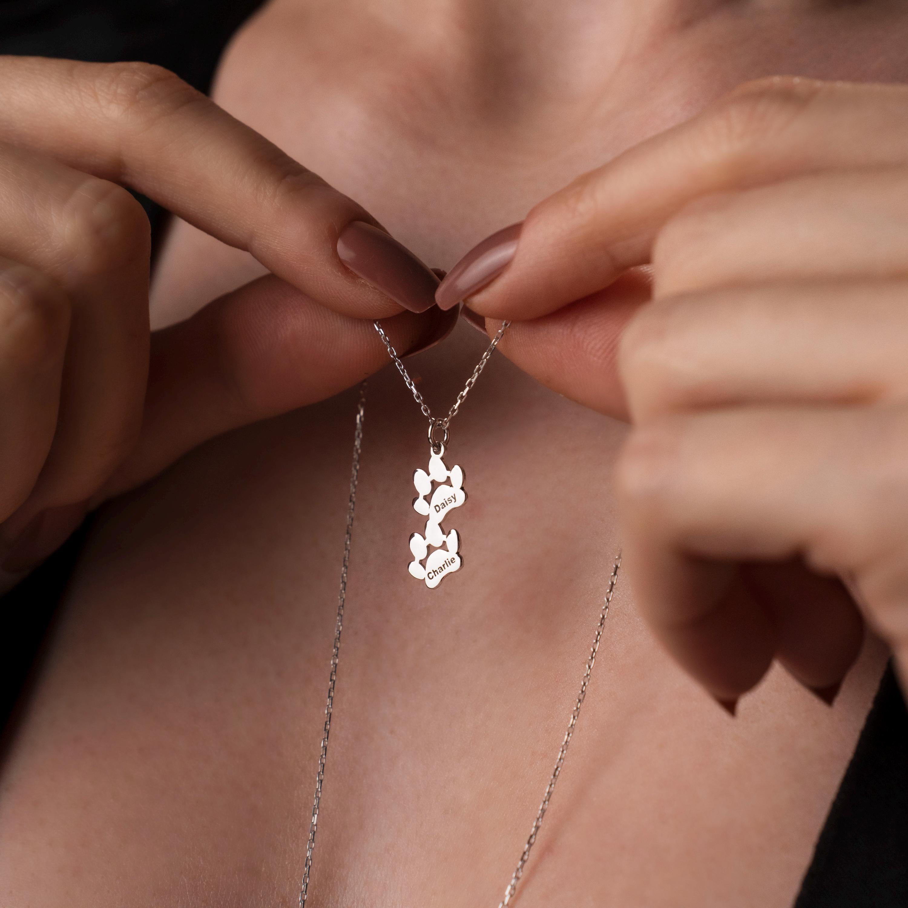 Keep your fur baby close to your heart with this custom paw print necklace - a perfect gift for any pet lover